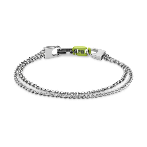 The BANE - Polished bracelet by Armor of the Free features a silver double-chain strap, a rectangular clasp, and a small green bead engraved with ARMOUR4 ALLERGY FREE, boasting a minimalistic and modern design.