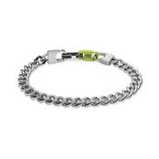 A chunky silver chain bracelet called VIRA - Polished by Armor of the Free, featuring curb links, a strap-inspired clasp, and a small green accent labeled ARMOR OF LIFE.