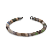 Armor of the Free’s GENO - Beige by Armor of the Free, single braided bracelet with multicolored patterns and metal tips.